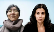 Fábio Nakagawa e Regiane Nakagawa durante entrevista, ambos com aparência séria e cenário de fundo claro.